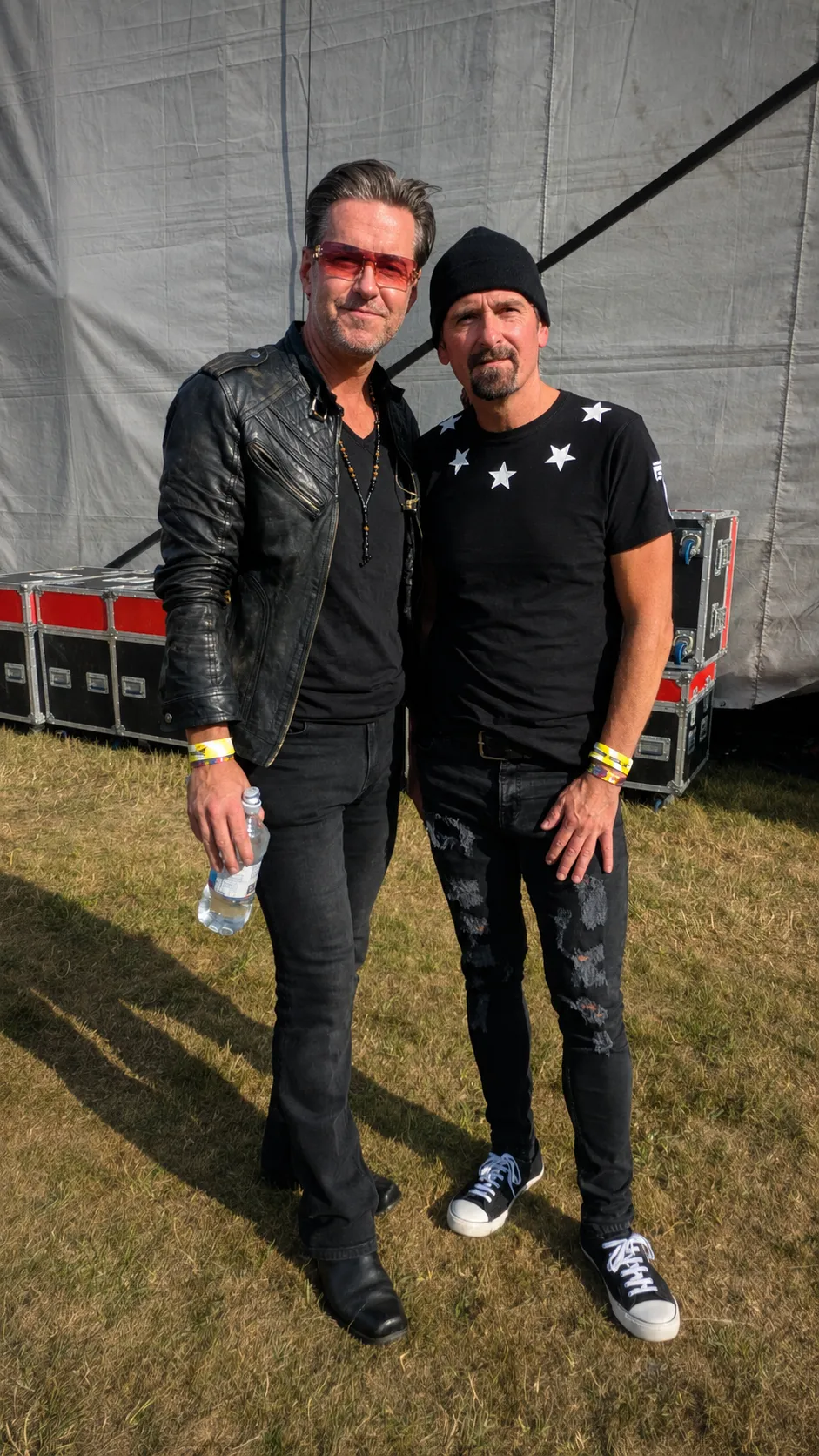U2.V2 frontman and guitarist backstage at Tribfest by the flight cases